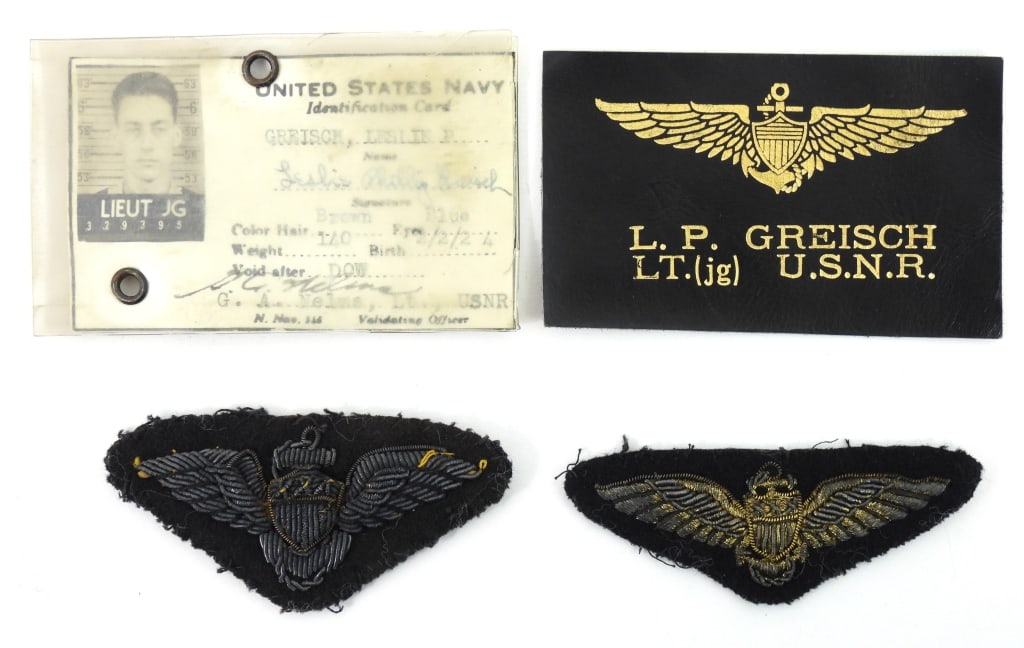 Lt. Leslie P. Greisch Balloon Pilot Group: Binder containing three leather wings identified to Lt. Greisch; two embroidered wings;identification cards drivers licenses; liberty pass; officers club cards; and image of Greisch with other