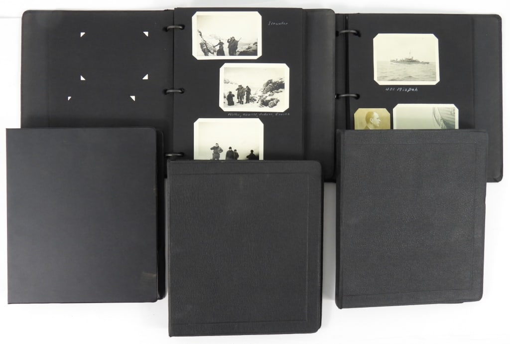 Large Collection of USCG Photos: Five binders of photos of United States Coast Guard patrol ships at sea, dry dock, Cuba, Greenland, Newfoundland, English Channel, Rotterdam, New York Harbor, pages of flowers collected in Greenland,