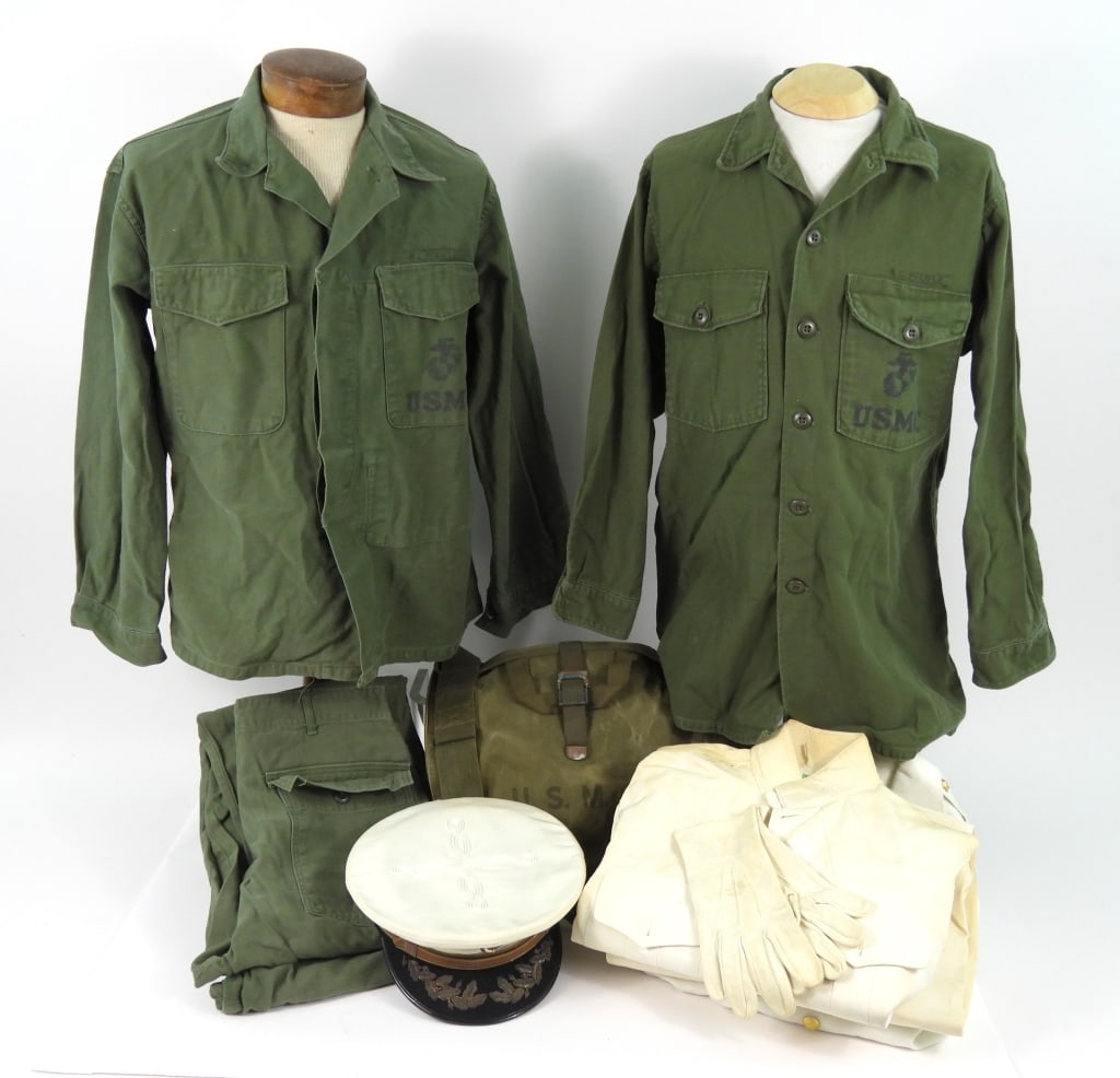 USMC Uniforms of R.C. Pfeifle: A green cotton USMC utility shirt with eagle, globe, and anchor printed on the left pocket and hidden buttons on the front; a green cotton USMC utility shirt with an eagle, globe, and anchor printed