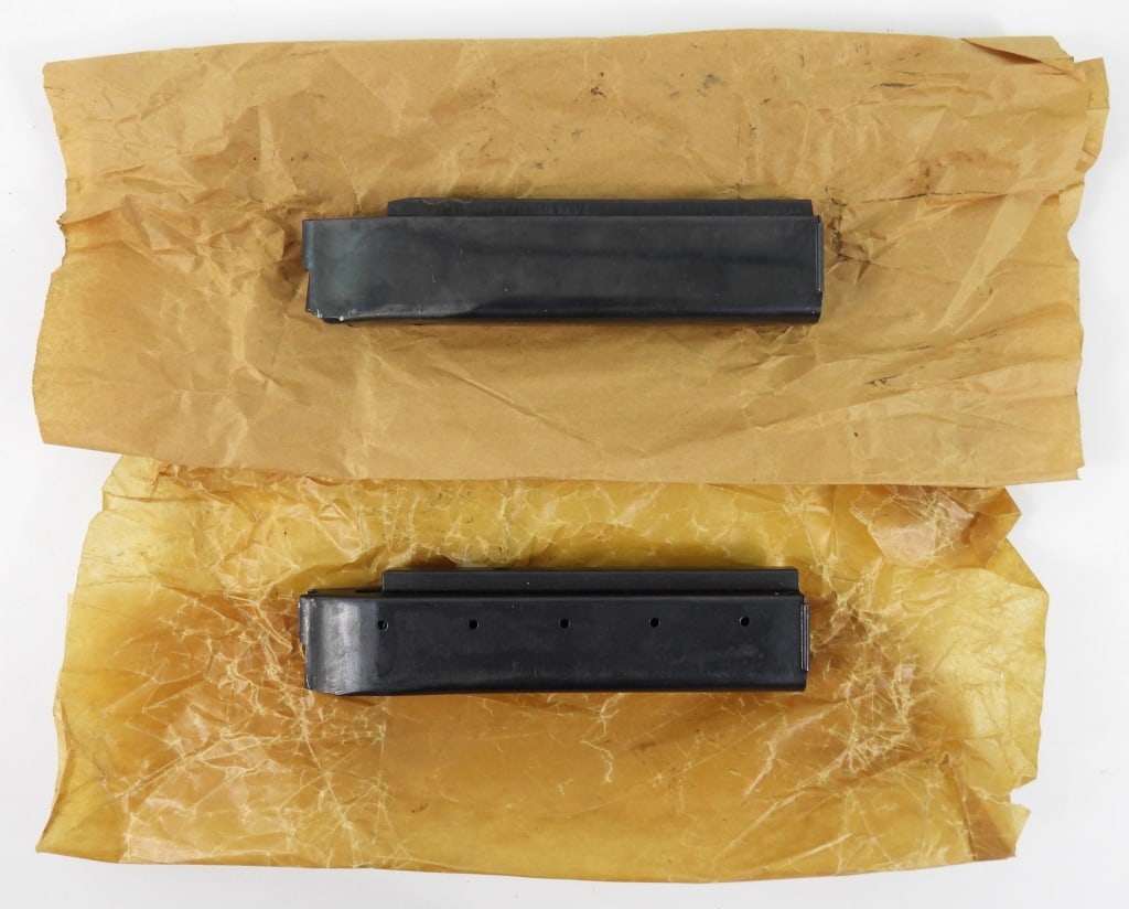 Two Blued Reising Model 50/55/60 Magazines: Two blued Reising Model 50 magazines, marked on the front face "H & R - REISING/MODEL 50 - CAL 45 MAGAZINE/HARRINGTON AND RICHARDSON ARMS CO./WORCESTER, MASS. U.S.A.", and marked at the bottom face