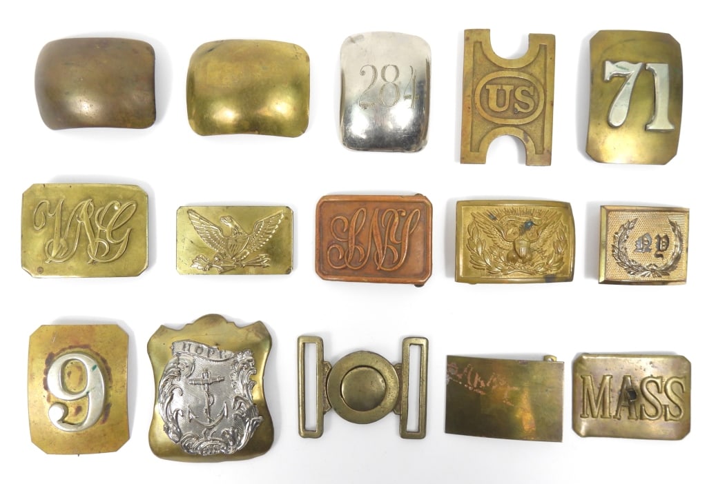 Group of Militia Breast and Belt Plates: Two plain brass breast plates; a plain belt plate; a "MASS" belt plate (damage); two New York belt plates; a brass breast plate marked "71"; a brass breast plate marked "6"; a State of New York belt