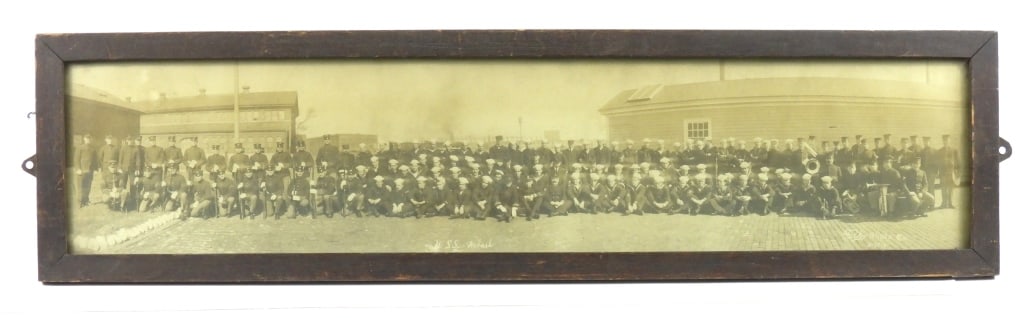Framed Yard Long of the Crew of the USS Wabash: Oak-framed yard long image of the crew of the USS Wabash including a detachment of U.S. Marines, marked "Falk Photo Co./Boston" on the right side.Note: The USS Wabash was used as a barracks ship at