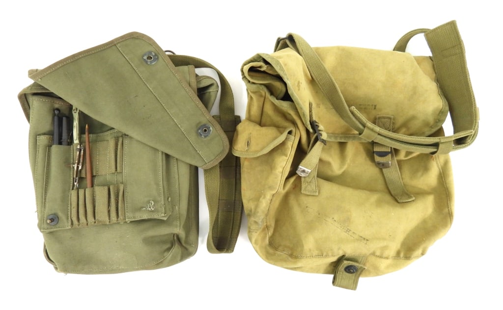 Identified USMC Musette Bag and Dispatch Case: A M-38 dispatch case marked on the front of the flap "HUMPHREYS, K.S, JR.", marked inside the flap with a very light "USMC", with compass, ruler, scale, pencils, soap container with approximately 30