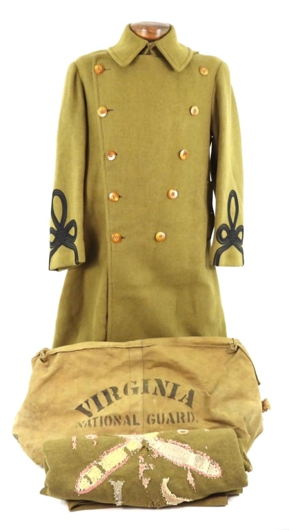 WWI-era US Officers Overcoat, Blanket, and Bag: A khaki canvas valise for a tent or other larger item marked "VIRGINIA/NATIONAL GUARD" on the front; a WWI officers overcoat with black soutache on the cuffs; and a blanket with embroidered crossed