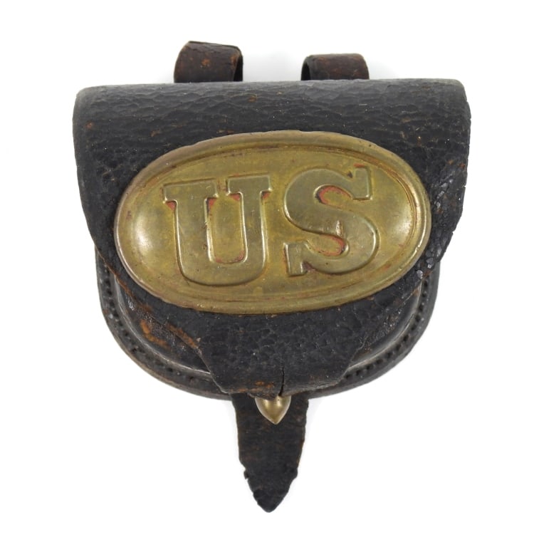 E. Gaylord Cap Box with Cartridge Box Plate: Black leather cap box with a lead-filled Model 1839 cartridge box plate attached to the front flap, inner flap marked "E.GAYLOR/CHICOPEE/MASS.", with vent pick and fur inside the pouch. United States