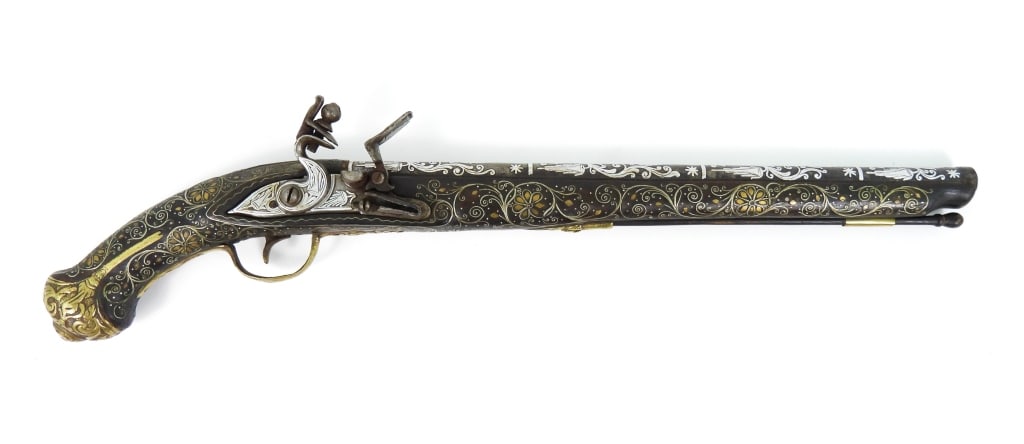 Silver Inlayed Ottoman Flintlock Pistol: .60-inch bore, NSN, walnut stock with ornate silver wire and brass inlays, lock, cock, and hammer have silver designs, brass trigger guard, side plate, and butt cap, silver designs on the barrel, and 