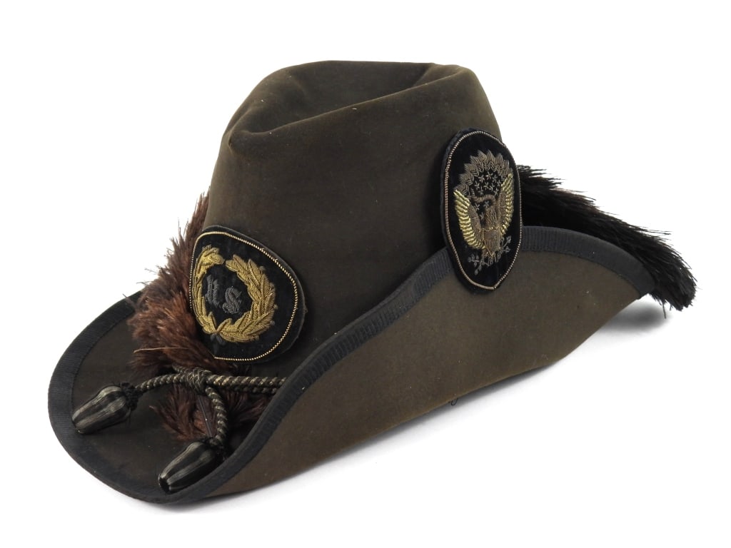 Civil War Union Officer's Model 1858 Slouch Hat: Black Model 1858 or "Burnside" style hat with black silk ribbon around the brim, an embroidered wreath and "U.S." insignia on the front, officer's hat cords, ostrich plumes, the left side folded up