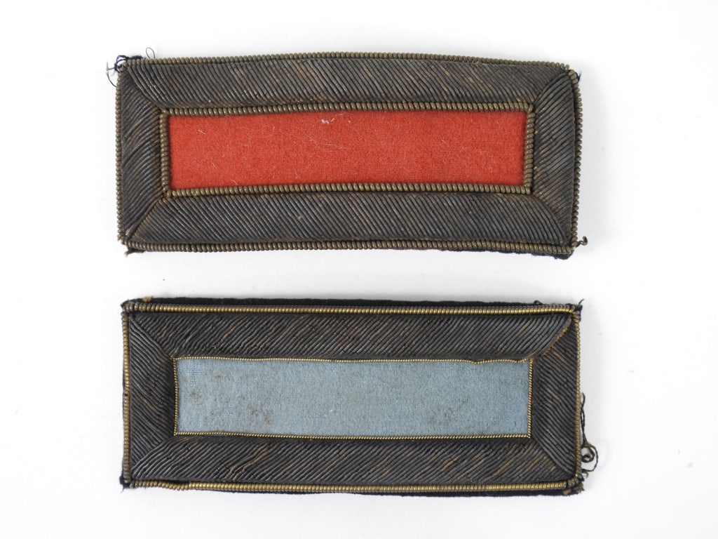 Group of Civil War 2nd Lieutenant Shoulder Straps: A pair of infantry shoulder straps; a pair of artillery shoulder straps; a pair of cavalry shoulder straps, a single infantry shoulder strap; and a single artillery shoulder strap. United States C.