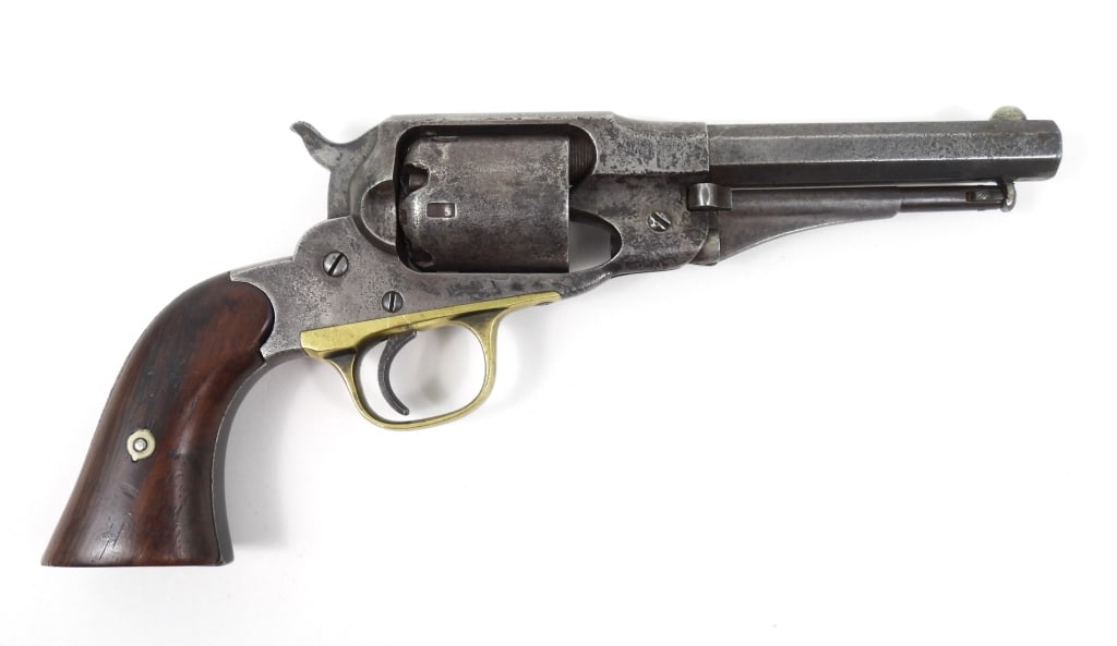 Remington New Model Pocket Revolver: .36-caliber, serial number 12733, walnut grips, brass trigger guard, with the address on the top of the octagonal barrel. United States Barrel lg. 4 1/2" Overall lg. 9"