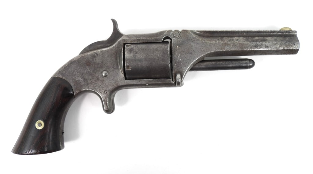 Smith & Wesson Model 1 1/2 Revolver: .32-caliber, serial number 18650, walnut grips, with the address and patent on the top flat of the barrel. United States Barrel lg. 3 1/2" Overall lg. 8"