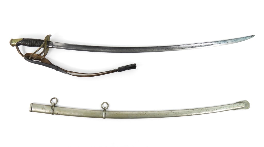 US Model 1860 Ames Light Cavalry Saber & Scabbard: Brass hilt, wire-wrapped leather grip, steel blade with light Ames marking on one side of the ricasso, and "US/G.W.C./1864" on the other side, with a plated steel scabbard and a leather sword knot mar