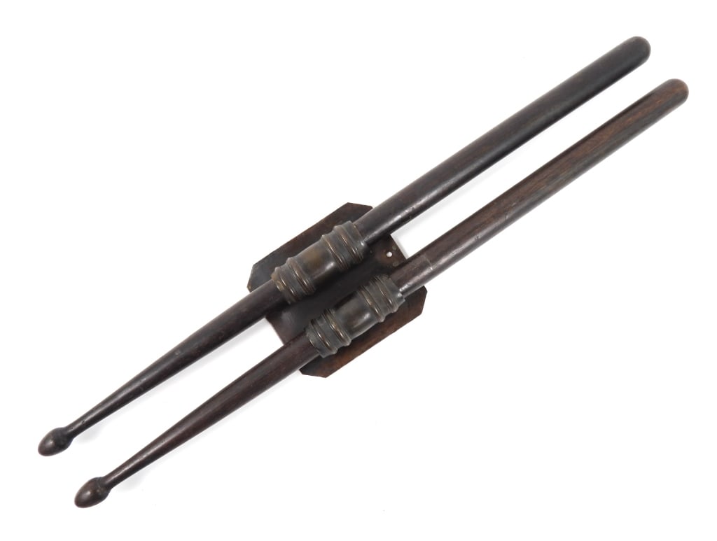 Civil War Drumsticks and Brass Carriage: A pair of rosewood drum sticks in a brass carriage for mounting to the leather belt, with remnants of iron wire on the back for attaching to the belt. United States Overall lg. 17 1/8"
