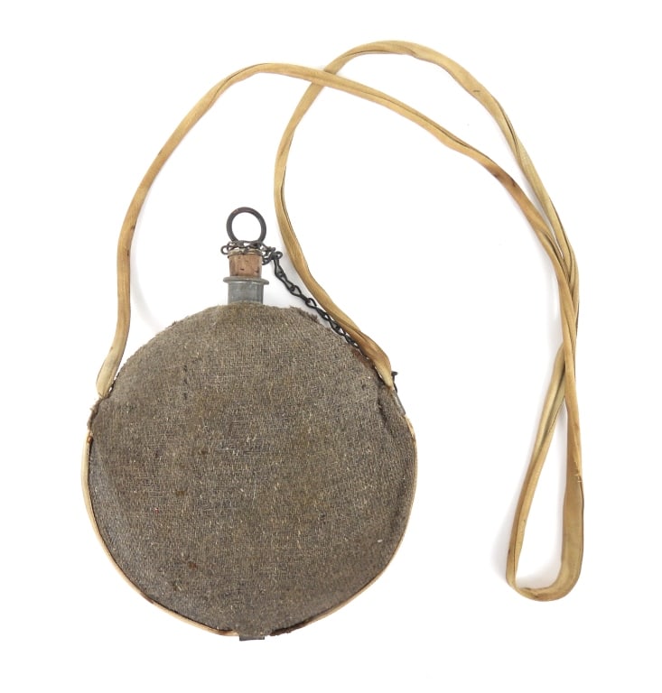 Civil War-era Cloth-covered "Smooth Side" Canteen: Model 1858 "smooth side" canteen with a cloth cover, stopper and chain, and a sewn herringbone twill strap. United States Overall closed lg. 4 5/8" Overall ht. 10 1/2"