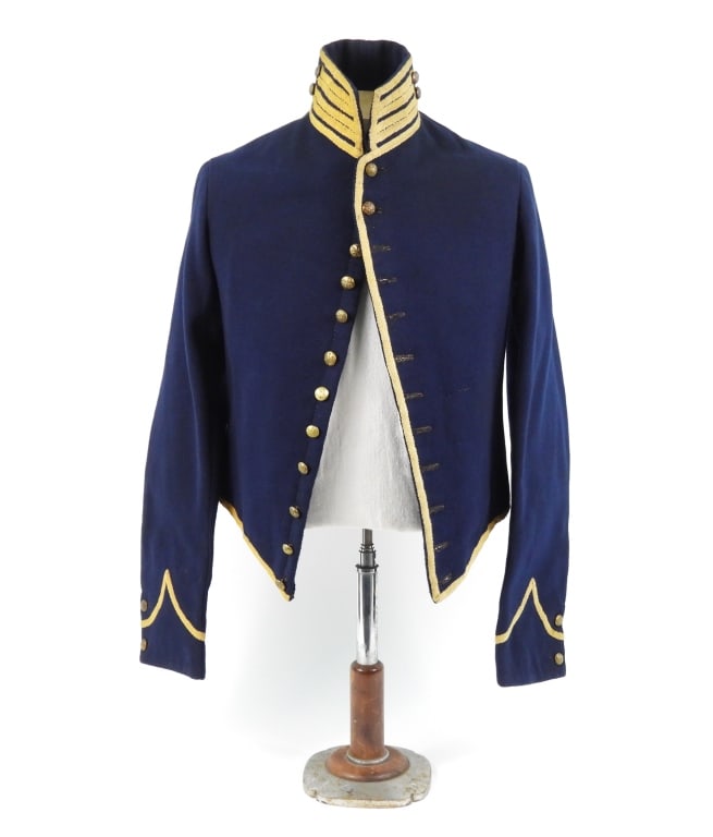Civil War Cavalry Mounted Services Jacket: Entirely hand sewn dark blue jacket body with yellow herringbone twill tape, brass cuff-size eagle general service buttons on the front, collar, and cuffs, domet flannel body lining with striped wool