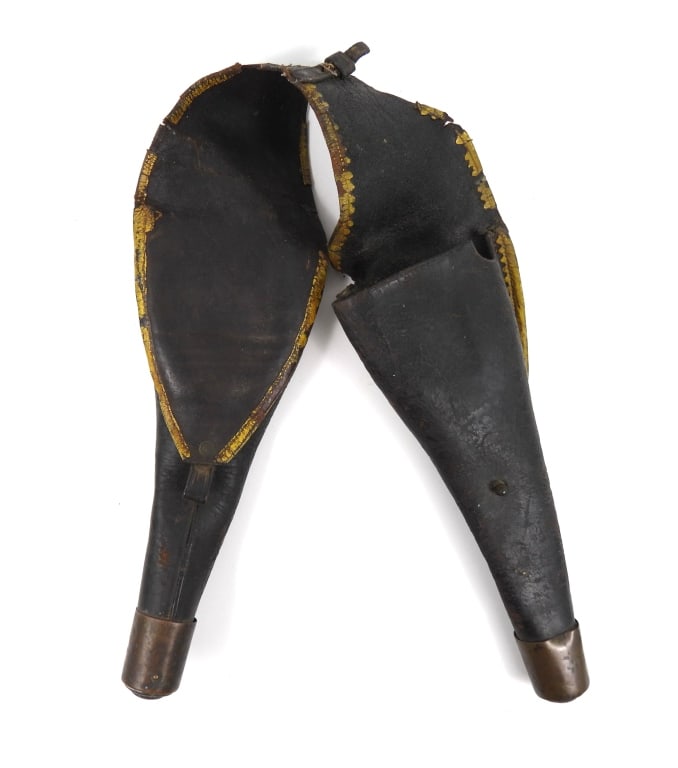 Pair of Civil War-era Pommel Holsters: Black leather and yellow-painted bands with scalloped edges, and brass caps. United States