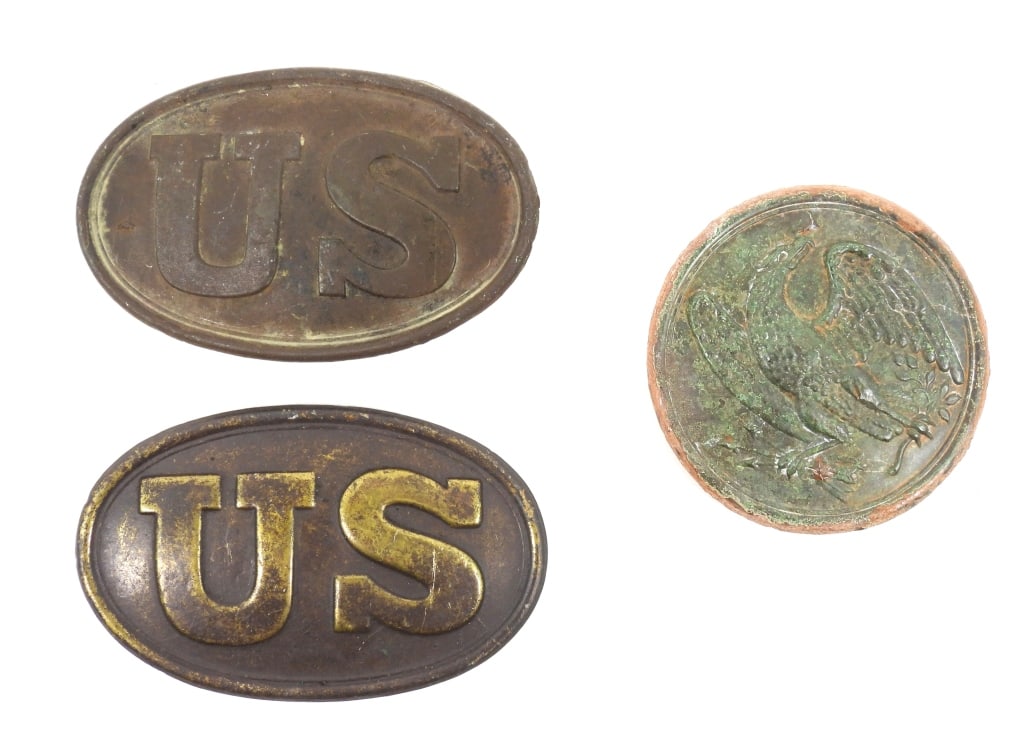 Three Dug Civil War Cartridge Box Plates: A lead-filled brass plate marked "US" with one surviving iron wire attachment loop, marked on the back "Fredericksburg/Mayors Heights"; a lead-filled brass plate marked "US" with no remaining iron wir