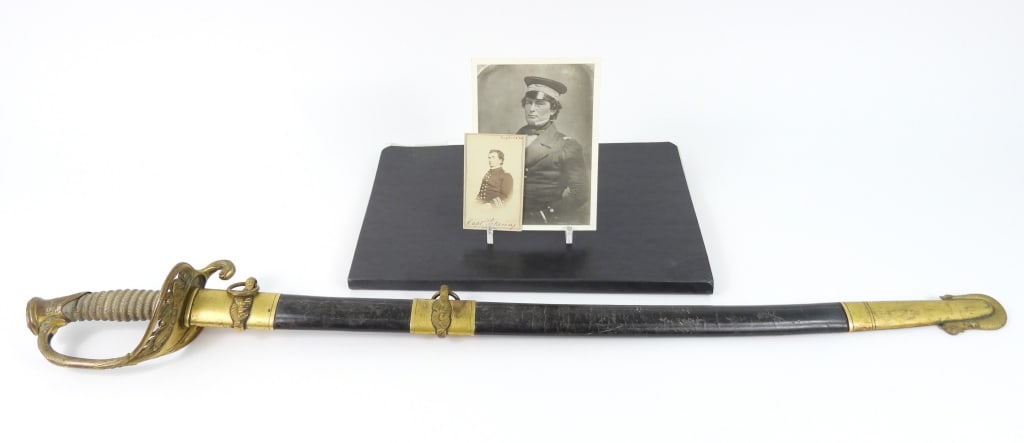 Sword and Documents of Capt. Charles W. Pickering: A U.S. Model 1852 naval officer's sword with a brass hilt with remnants of gilt finish, shagreen grip, an eagle and stars on the pommel, with foliate designs, dolphins, a pierced hilt marked "USN",