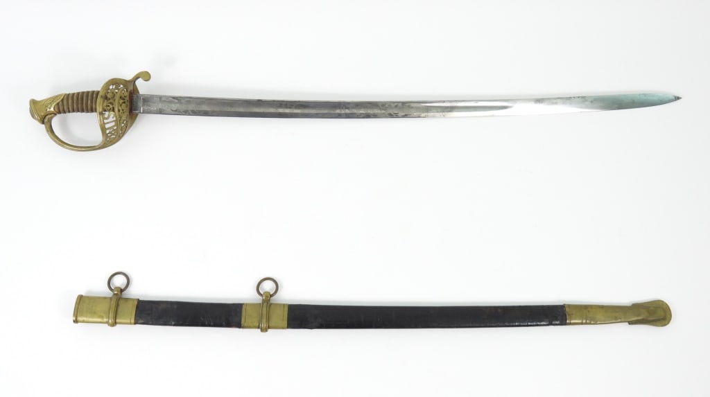 Identified Roby 1850 Staff & Field Officer's Sword: Gilt brass hilt with foliate designs on the pommel, pierced counter-guard with foliate designs and "US", shagreen and wire-wrapped grip, blade marked "IRON PROOF" on the spine, ricasso marked "C. Roby