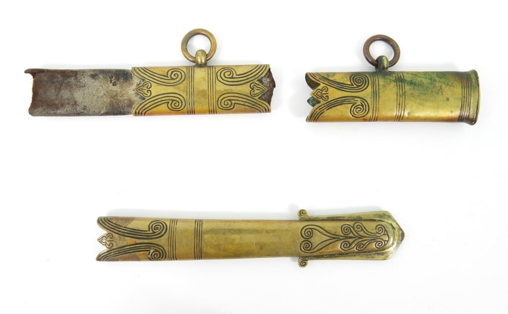 CSN Lieutenant John Low's Sword Scabbard Parts: English Isaac & Campbell Pattern 1827 naval sword brass throat, middle band with attached leather, and drag, with printed notes that these came from the sword of Confederate States Navy Lieutenant Joh