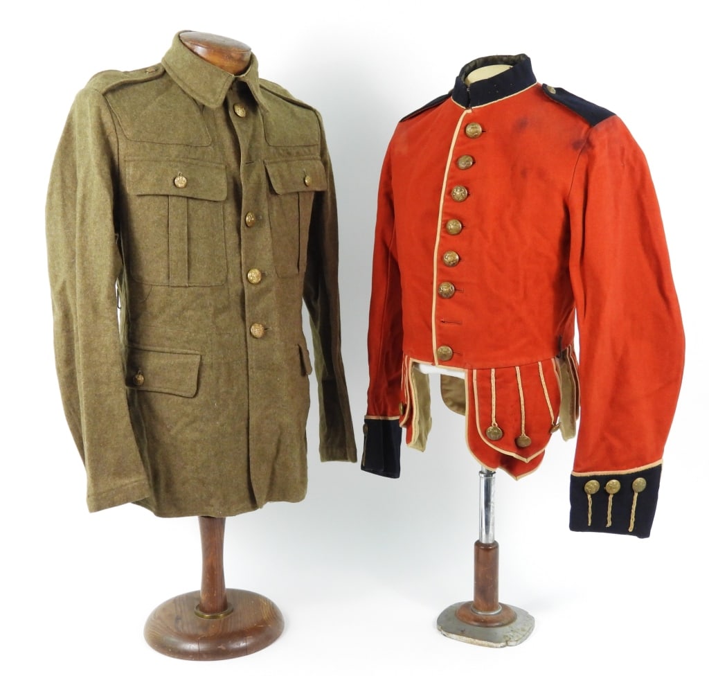 Two British Tunics: A red broadcloth tunic with a blue collar, white welting, brass three-piece buttons with the Royal Crest, blue collar, cuffs, and shoulder straps, and a white serge lining, white plain woven cotton