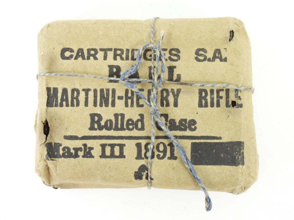 Vintage Martini-Henry 1891-Dated Mark III Ammo: Brown paper package tied with string, marked "CARTRIDGES S.A./BALL/MARTINI-HENRY RIFLE/Rolled Case/Mark III 1891" with a small broad arrow. England Overall wd. 3 1/2" Overall ht. 3"