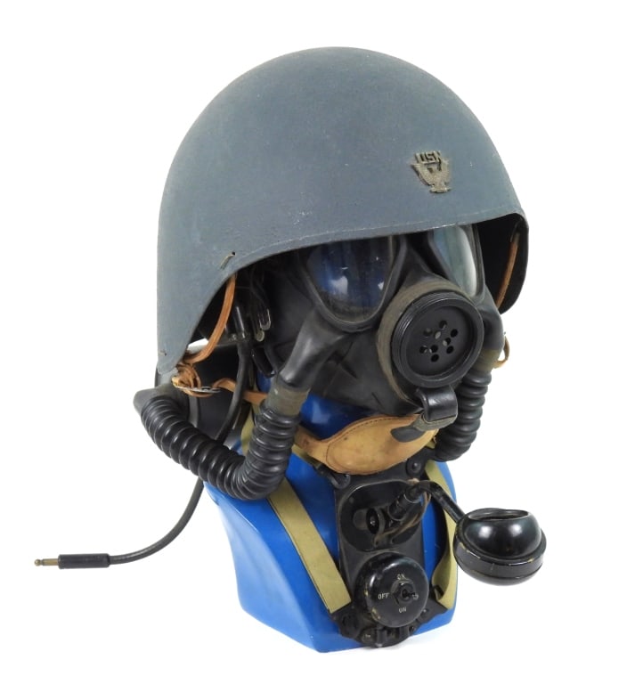 WWII US Navy MK II Talker Helmet, Mask, and Radio: Deck blue-painted helmet with a U.S. Navy cap badge on the front, liner and strap; a radio set, and a gas mask. United States