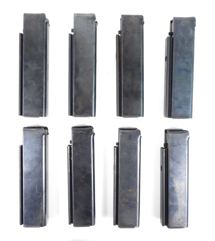 Eight Auto Ordnance Thompson SMG Magazines: Eight 20 round Thompson SMG magazines marked "AUTO ORDNANCE CORP./BRIDGEPORT, CONNECTICUT/REG. IN U.S. PAT. OFF.", one marked with "U" on the back of the magazine near the floor plate. United States