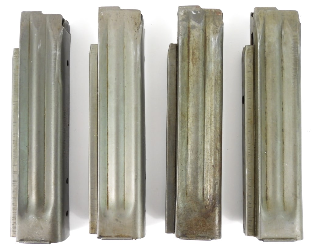 Four Reising Model 50/55/60 Magazines: Four Reising Model 50/55/60 magazines with gray finish, marked on the front face "H & R - REISING/MODEL 50 - CAL 45 MAGAZINE/HARRINGTON AND RICHARDSON ARMS CO./WORCESTER, MASS. U.S.A.". United