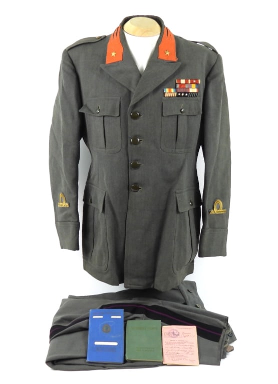 WWII-era Italian Army Tunic and Breeches: Gray/green twill woven tunic, orange insignia sewn to the collar with a brass star on each side, green buttons, ribbon bars on the left breast, three Italian passports in the pocket; and a pair of bre