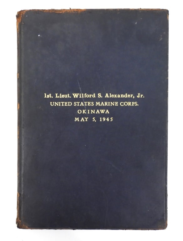 Remembrance Book of 1st Lt. Wilford Alexander Jr.: Bound remembrance book embossed in gold leaf "1st. Lieut. Wilford S. Alexander, Jr./UNITED STATES MARINE CORPS./OKINAWA/MAY 5, 1945", containing an image of Lieutenant Alexander, with pictures of the