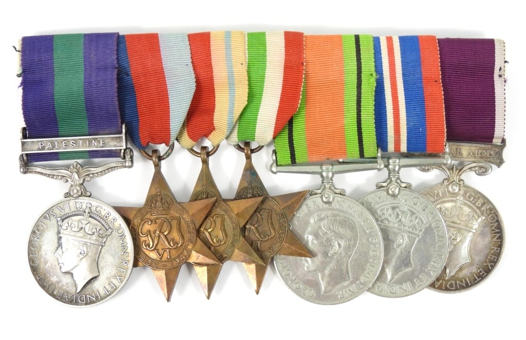 WWII British Medal Grouping I'D W-Hanging Bar: Six campaign medals affixed to a suspension bar that include: An English General Service Medal with Palestine clasp I'D to "4341301 CPL. E. F. Sewell E. York. R" Appears to be silver but not tested. A