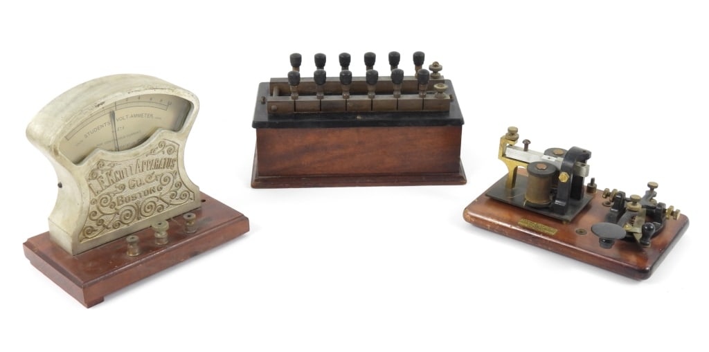 Late 19th Century Telegraph Grouping: A Boston Scientific telegraph key which is missing a couple of pieces on the armature and coils. An L.E. Knott Apparatus Co. telegraph resistance box, and a volt ammeter.