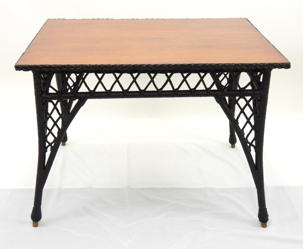 Antique Kaltex Wicker / Wood Table: This high quality grained wood and wicker table was with the Kaltex set that is offered in this auction. It appears to be of the same manufacture of Kaltex, having brass foot covers, but it is not
