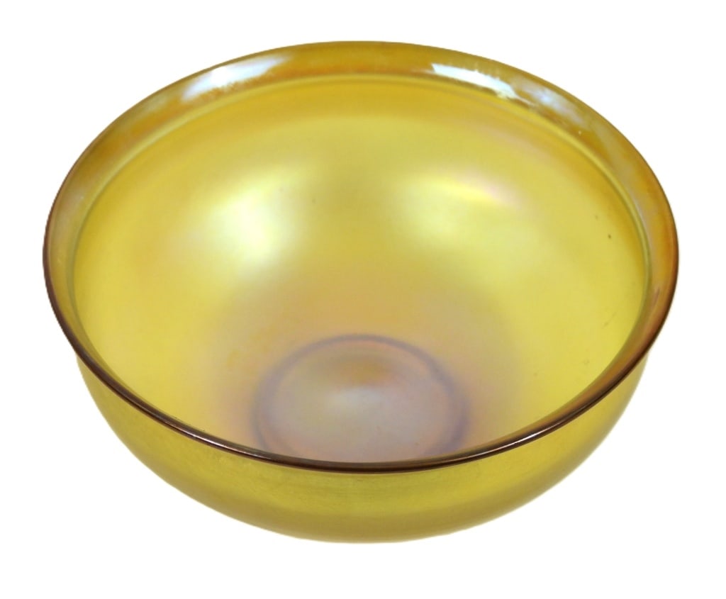 Louis Comfort Tiffany Favrile Glass Bowl: Favrile glass berry bowl with iridescent blue and pink flashes. Measures 2" high x 4-5/8" diameter.