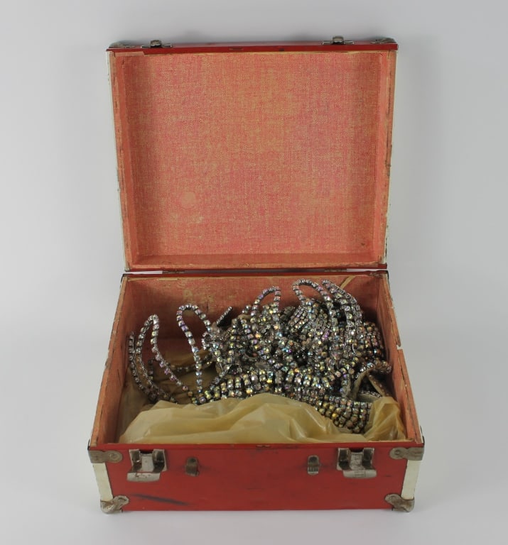 9PC C1940s Cabaret Rhinestone Costume: This unusual dancer set includes a white and a gold colored necklace, a rhinestone wire bra, a belt, two pairs of rhinestone underwear, a garter, and a pair of arm bands. From a stripper / striptease 