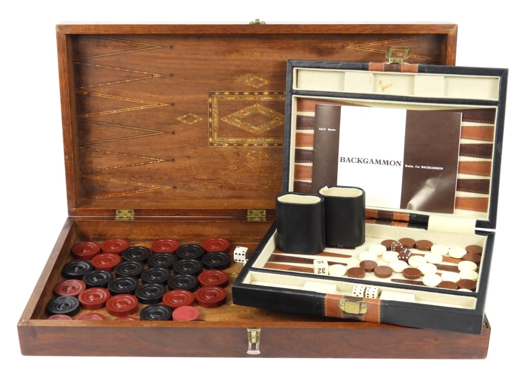 2 Backgammon Board Sets: Antique hand made lovely detailed marquetry Backgammon hinged box with early black and red counting pieces. 1 Original red piece is missing. Measures 20.5" x 20.5" open and 3.25" deep closed.A modern