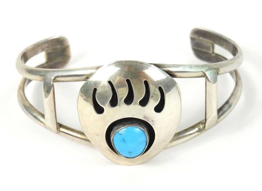Native American Style Romero Sterling Bracelet: Stamped to rear with Foot design and "ROMERO SS / STERLING" A classic Navajo design. Weighs approx. .92 ozt.