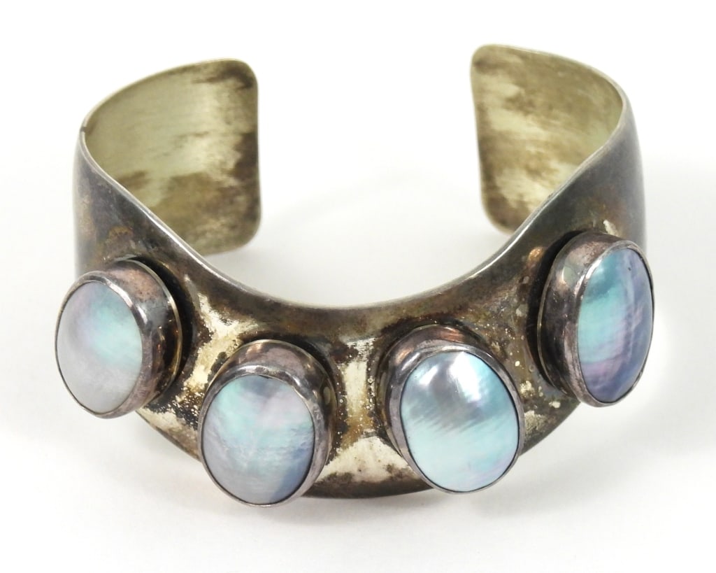 Vintage Jay King Desert Rose Sterling Bracelet: Hand made and stamped to rear "DTR 925" Desert Rose Trading Company with 4 MTP type inserts. Bracelet is 7/8" wide and weighs approx. 1.38 ozt.