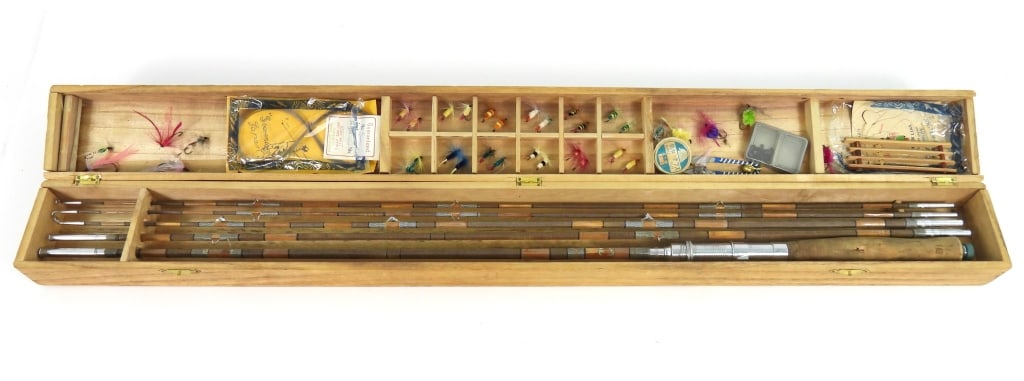 Vintage Cased Japanese Fishing Rod Set: Appears to be a 1950s or 60s Fly fishing set that includes the 3 section rod with 2 extra size tip sections, flies, line, swivels, weights, and other accessories on original wood case.