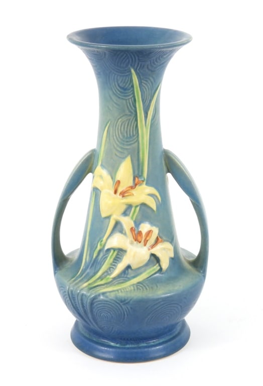 Roseville Pottery Vase 140-12: Bermuda blue color with Zephyr Lily flower pattern. Measures 12-1/2" high x 6-1/2" wide.