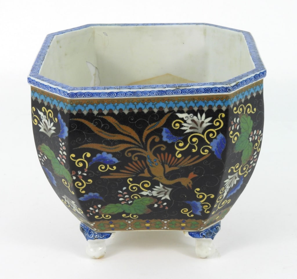19th-C Cloisonne On Ceramic Planter: Unusual form that appears to be Meiji period hexagonal planter 4 tripod foot planter or cache pot having Phoenix birds in flight and florial patterns on each side panel. Signed on bottom likely being