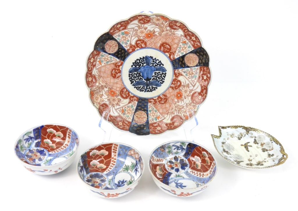 Grouping Of Japanese Porcelain: An Imari scallop edge plate that measures 10" diameter. 3 small Imari bowls that measure 5" in diameter, one has several flea bites to top edge. An egg shell Meiji period serving dish with a painted