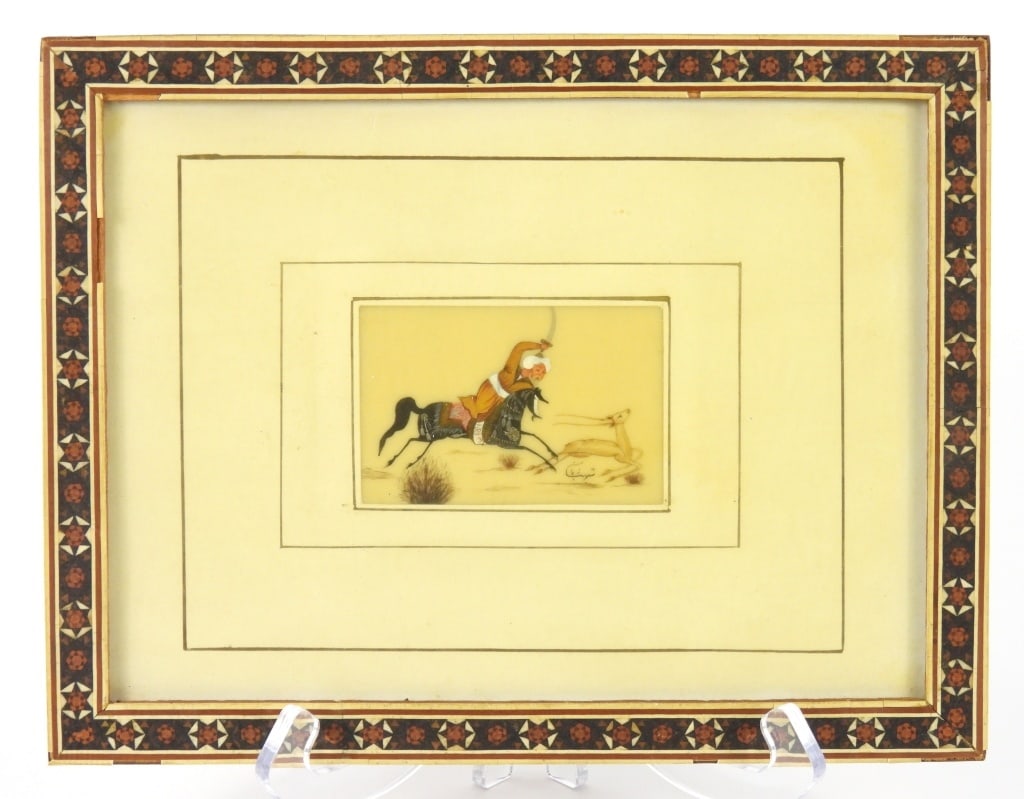 Persian Miniature Bone Painting: An illegible artist signed hunting scene of a man on horseback chasing a gazelle. Marquetry inlay frame has some loss at corners.Overall with frame 8 1/8" x 10 1/2"