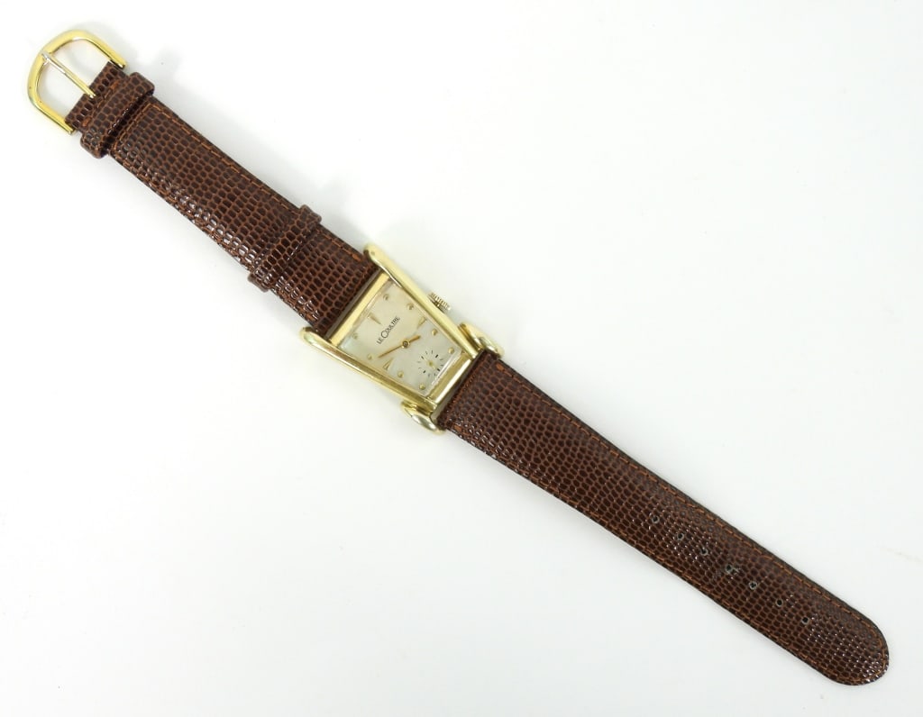 Jaeger LeCoultre Grasshopper Men's Watch: Appears to be 1950s era, 10K Gold Filled case Aristocrat Grasshopper wrist watch with #19 DeBeer Lizard leather 9" overall band. Silver color brushed dial. Not opened or removed from 1" x 1.5" bezel.