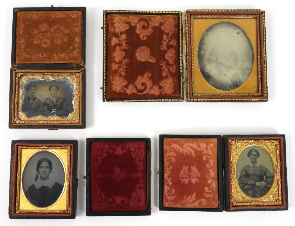 Group of 4 Antique Photographs in Cases: Group of three 19th century Ambrotypes, including a 9th plate portrait of two women, a 9th plate portrait of a beautiful woman with a hand tinted brooch, a 6th plate image of a young girl that is fade