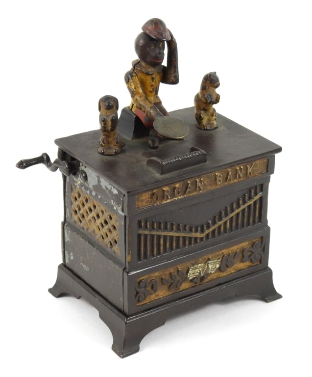 19th-C Organ Grinder Mechanical Bank: Kyser & Rex Frankfort PA. cast iron Monkey Grinder Dog and Cat revolving mechanical bank. Works properly, but does bind up here and there, and the bell does not ring. Measures 7-3/4" high.
