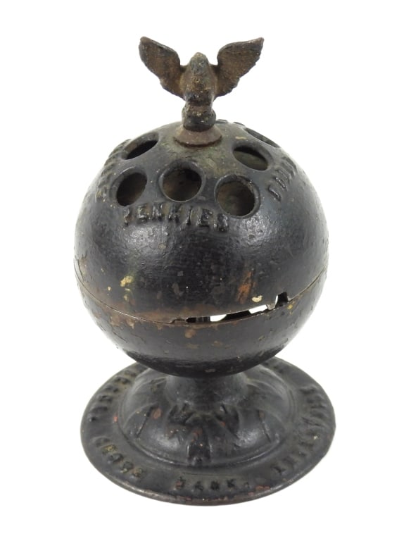 19th-C Globe & Eagle Cast Iron Bank: Enterprise Manufacturing Company Philadelphia PA. black painted world bank with "Pennies First Then Dollars" on top of globe. Appears to have been painted over original red and gold colors. Measures 5