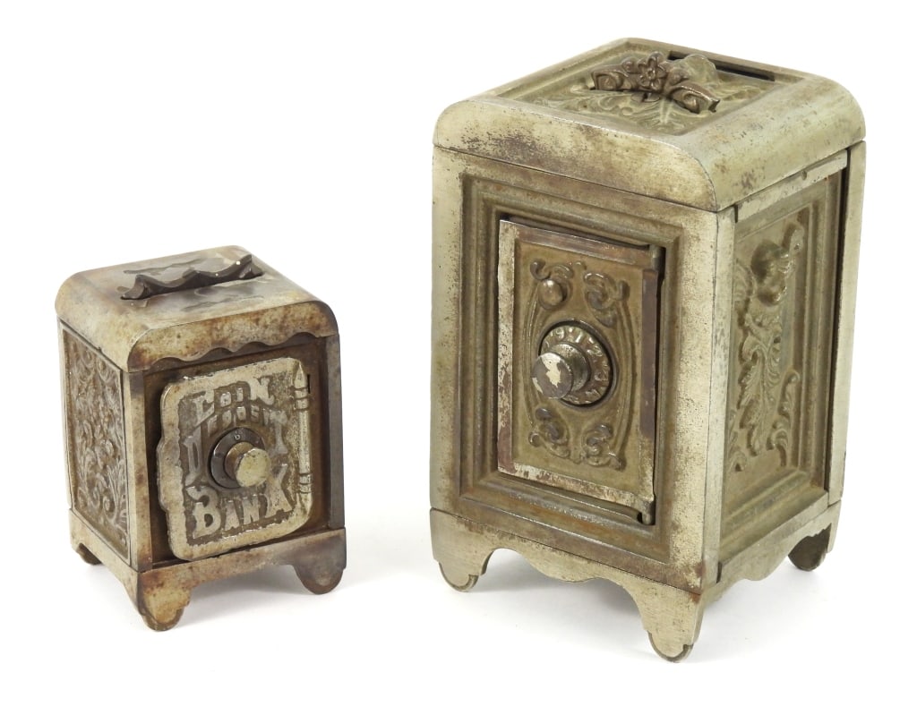Two Antique Cast Iron Combination Banks: Large bank is Nickel plated and made by the Kenton Toy company. It measures 7" high. Small coin deposit bank is not maker marked and appears to be Nickel finish. Measures 4-1/2" high. Each have a retr