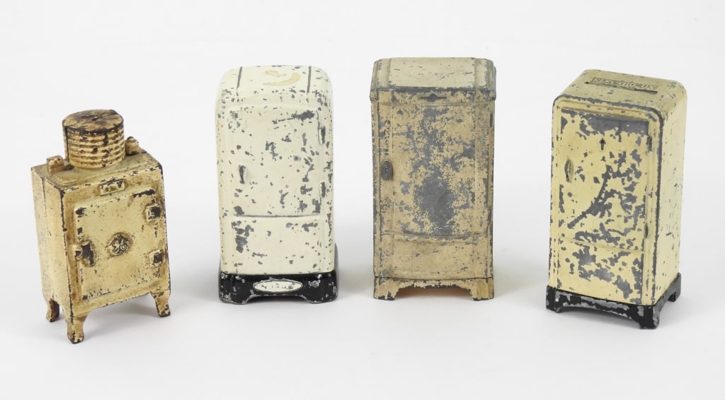 Four Refrigerator Banks: A cast iron Hubley Co. made G.E. refridge bank that is 3-1/2" high. A Super Cast Co. Electrolux refidge that is 4" high. 2 National Products Corp banks, one is Norge and the other is a Frigidaire.