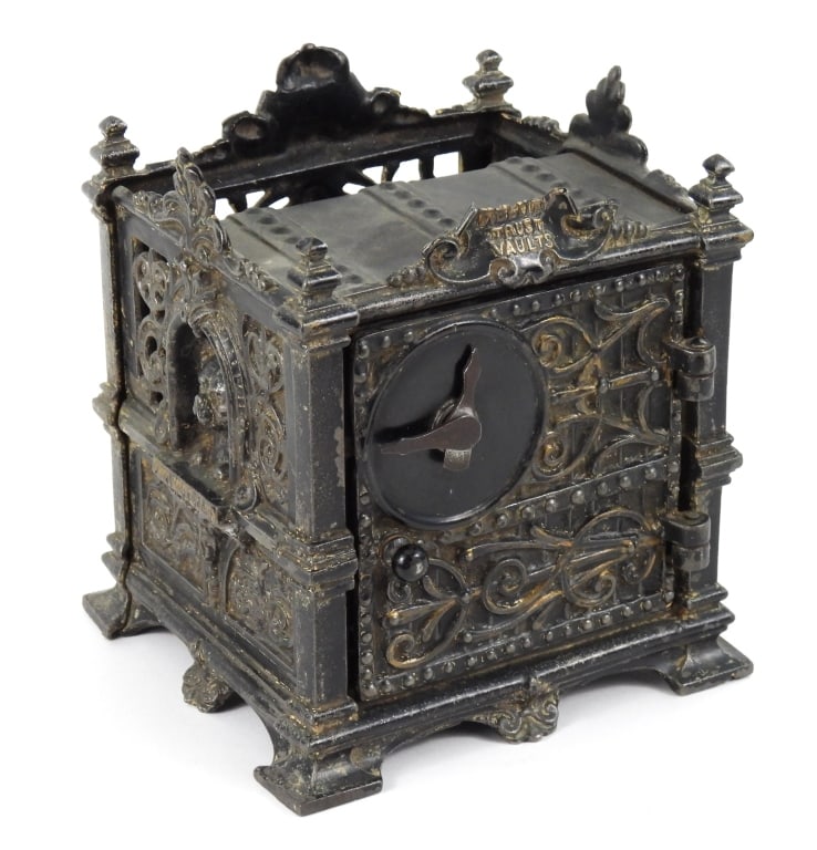 Fidelity Trust Vault Cast Iron Bank: 19th century cast iron J. Barton Smith Co. counting house bank with clock lock rear door. (10:35) is the code. Measures 6" wide x 5-3/4" deep x 6-1/2" high.